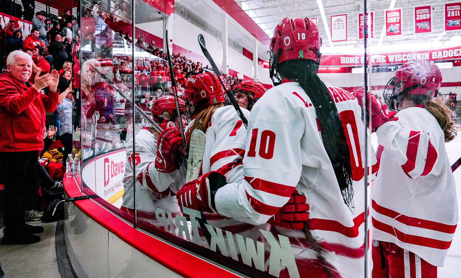 The Wisconsin women's hockey team celebrates a goal during the first period of its game against Ohio State on Saturday February 18, 2023 at LaBahn Arena in Madison, Wis.